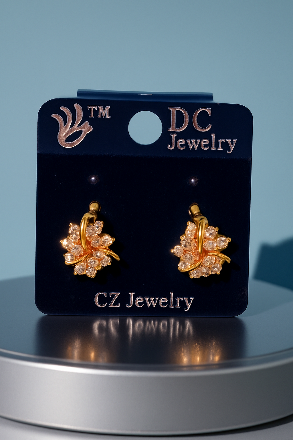 Elegant Leaf Earrings in Gold Finish with AD Engraving